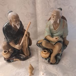 A pair of Asian fishermen
